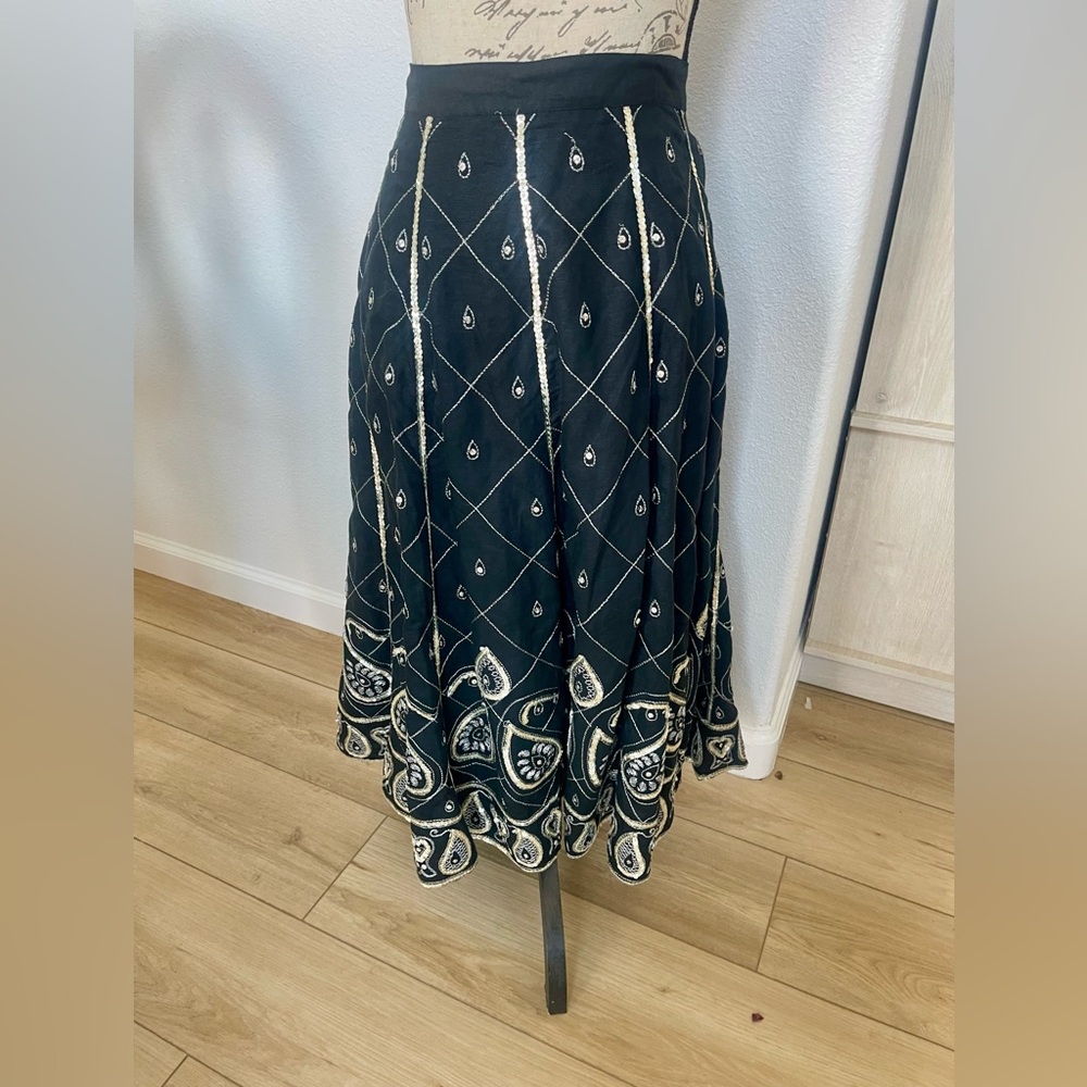WD-NY long flowy skirt in black with silver embellishment, size 14. EUC.